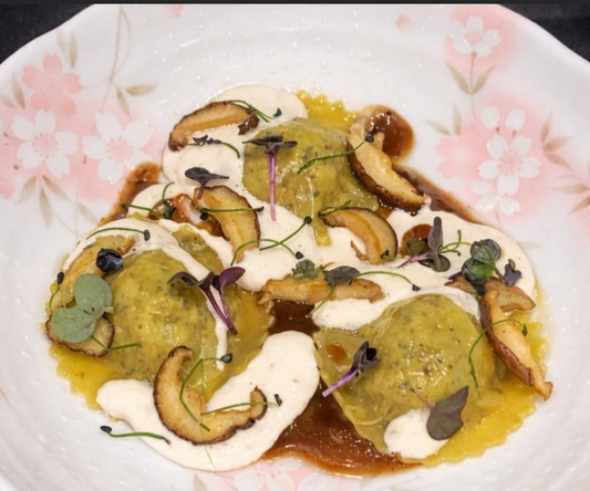 SHIITAKE MUSHROOM, WHITE TRUFFLE SAUCE RAVIOLI AND PINE NUT FONDUE AND CHICKEN JUS